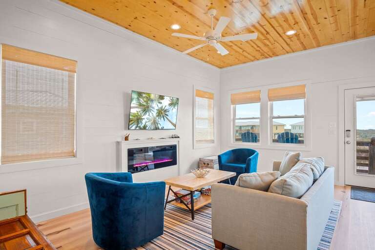 Bright Living Room With Furniture And TV
