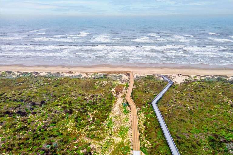 Boardwalk Through Dunes To Beach
