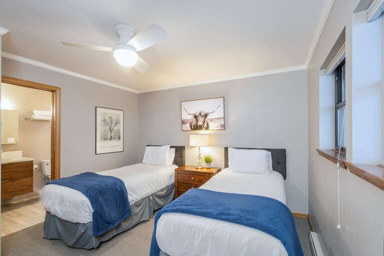 The second bedroom features two twins that can be made into a king bed upon request.