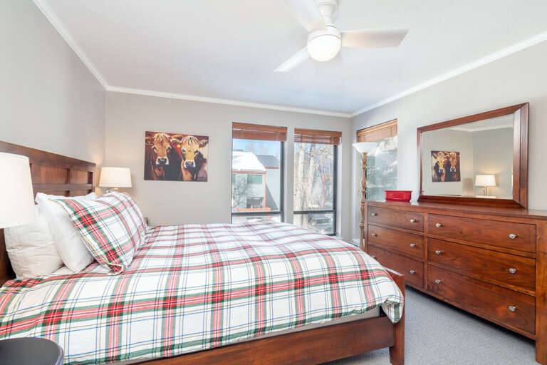 The Primary Bedroom in Boomerang Lodge 6 features a Queen Bed and large dresser to help make you feel at home.