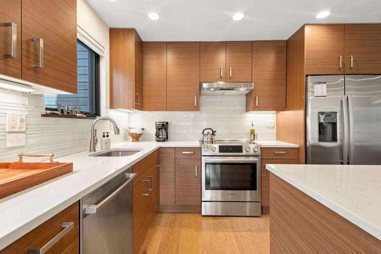 Fully stocked modern kitchen.