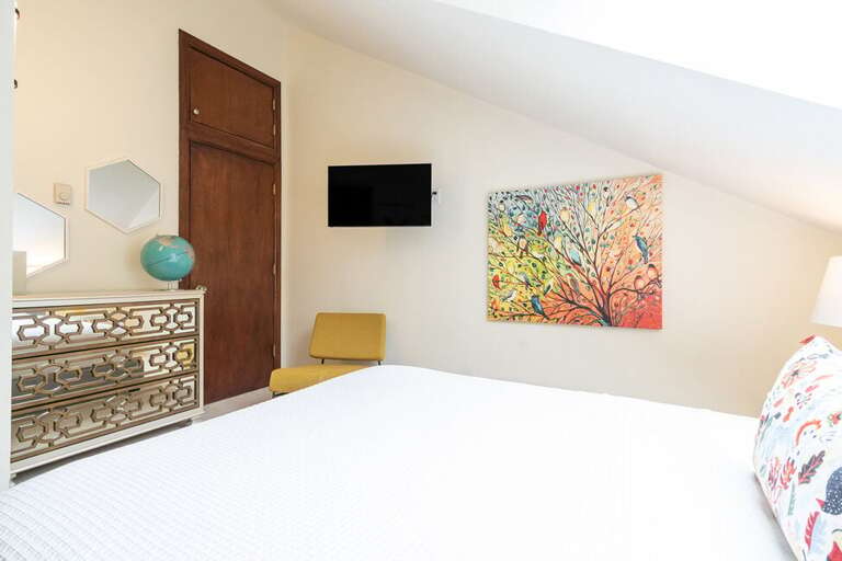Guest Room Two provides plenty of space and natural light for guests.