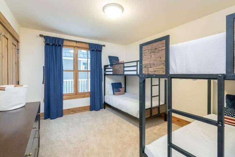 The bunk room features two stylish sets of twin bunk beds offering lots of space and a fun retreat for the kids! There is a full bathroom with tub just across the hall. The bunk room features two stylish sets of twin bunk beds offering lots of space and a fun retreat for the kids! There is a full bathroom with tub just across the hall.