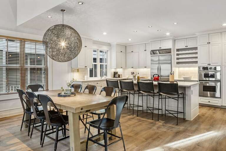 Open concept living area with gourmet kitchen, family dining, and spacious great room.