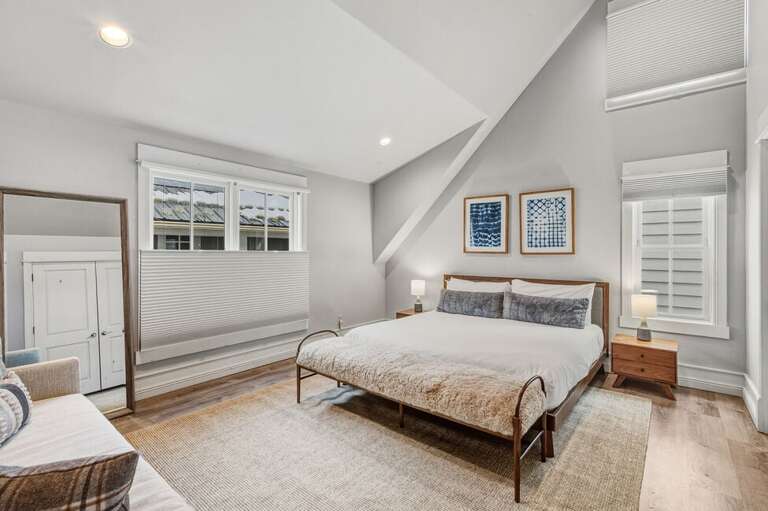 The primary suite encompasses the whole top floor and features a King Bed, ensuite bathroom, natural light and stunning views.