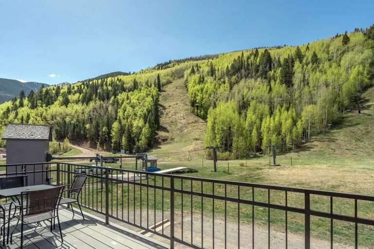 Cimarron Lodge 1 has a spacious, south facing deck that soaks up incredible views in winter and summer. Cimarron Lodge 1 has a spacious, south facing deck that soaks up incredible views in winter and summer.