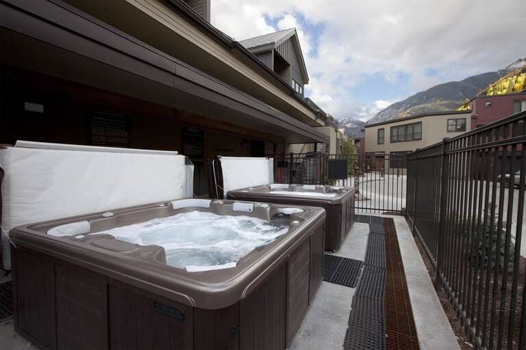 The Cimarron Lodge has two communal hot tubs -- the perfect way unwind after a day on the mountain. The Cimarron Lodge has two communal hot tubs -- the perfect way unwind after a day on the mountain.