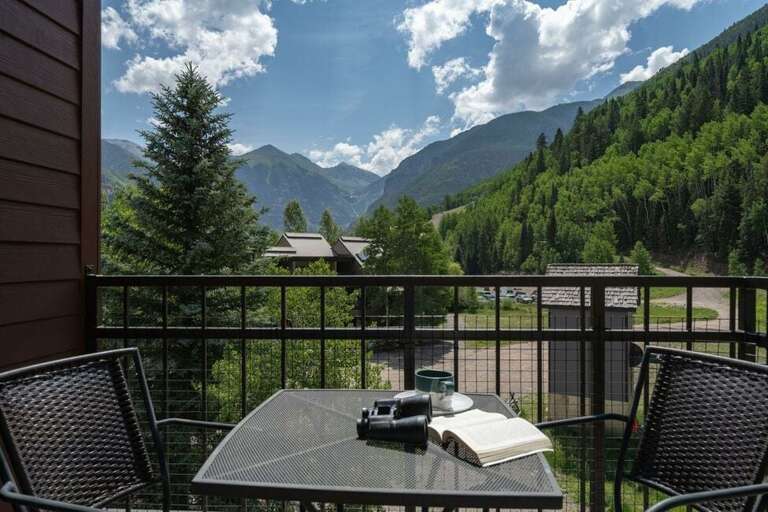 This small balcony off the primary suite is a private, picture perfect place to relax. This small balcony off the primary suite is a private, picture perfect place to relax.
