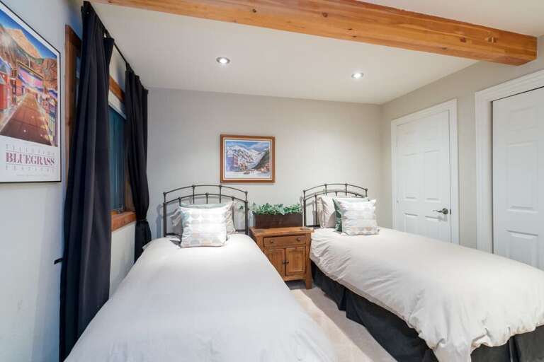 The twin guest bedroom is on the main living level. These twin beds can be made into a king with prior notice! The twin guest bedroom is on the main living level. These twin beds can be made into a king with prior notice!