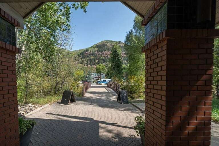 Walk through the Cimarron Lodge breezeway to find you are only a 3 to 5 minute walk to Clark's Grocery Store. Walk through the Cimarron Lodge breezeway to find you are only a 3 to 5 minute walk to Clark's Grocery Store.