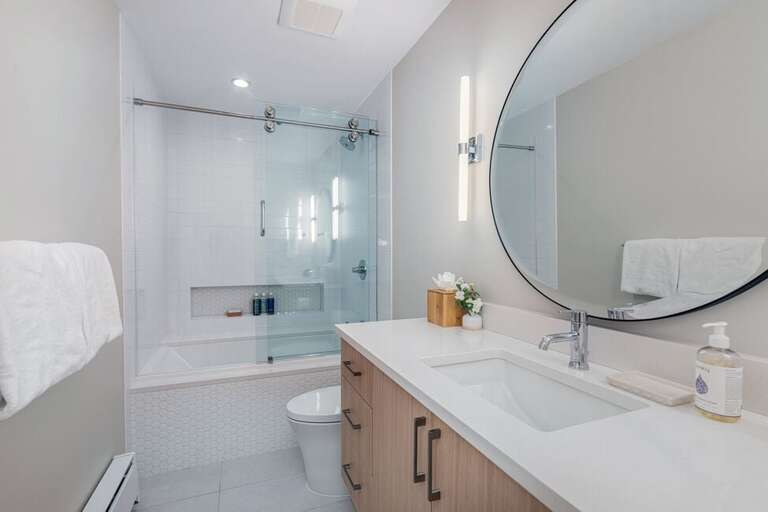 The bathroom on the main living level, next to the bunk room.