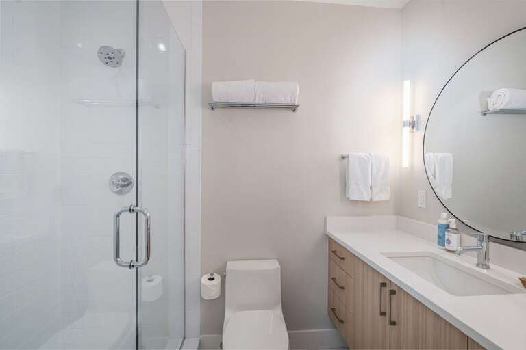 The queen guest bedroom has an en suite with a shower.