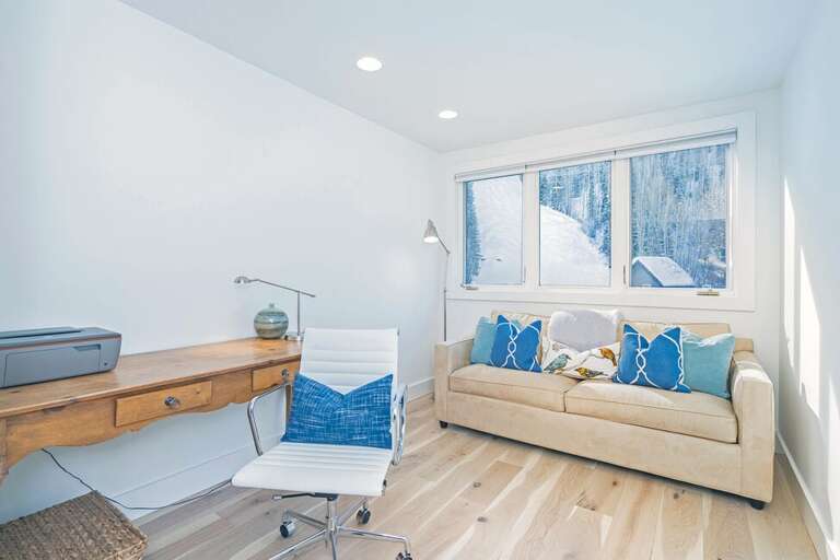 The spacious master has this additional area with a sleeper sofa & desk, with gorgeous views.