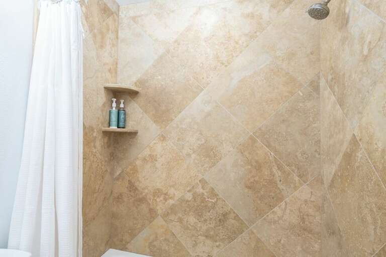 Large shower tub combo.