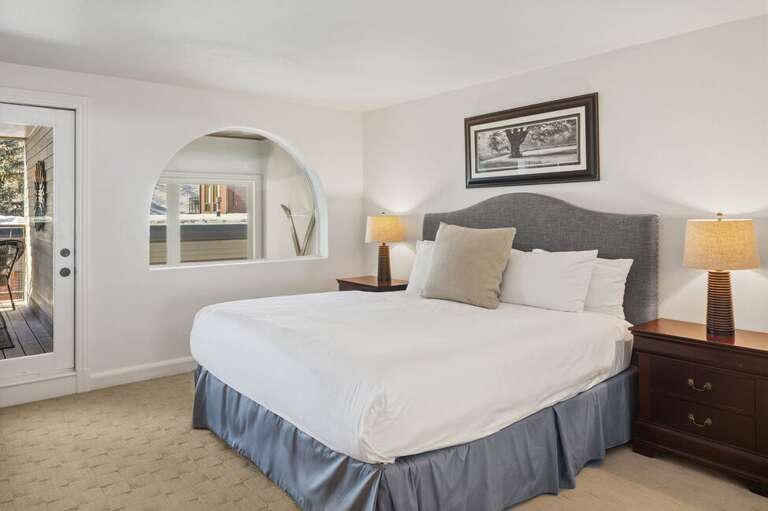 The Primary suite features private deck, king bed, ensuite bathroom and walk in closet.