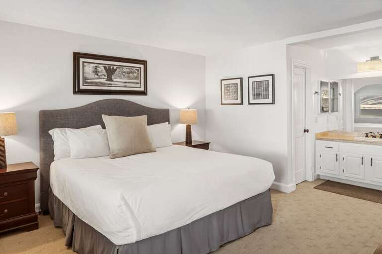 The primary suite features a private deck overlooking lift 7 and the Telluride valley and ensuite bathroom