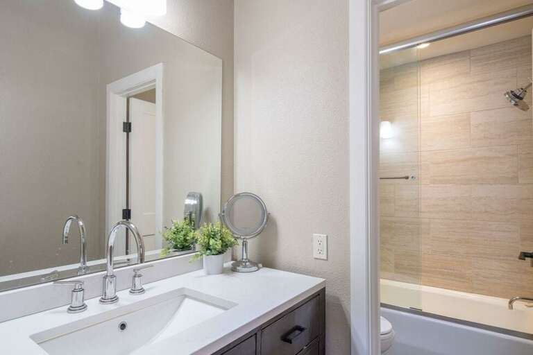 Ensuite bathroom in primary room.