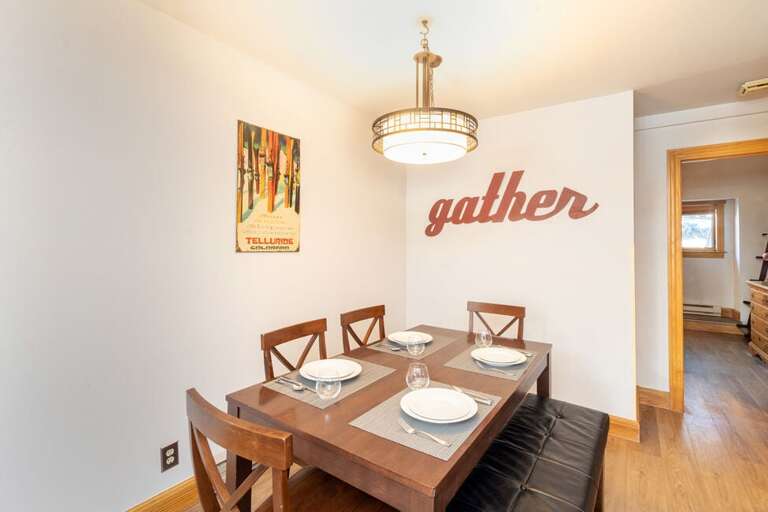 Dining area table can seat up to 6 people.