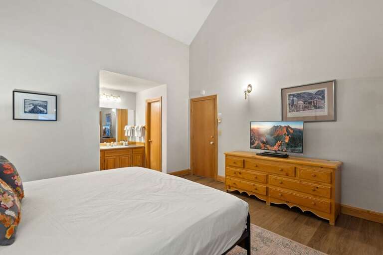 Spacious Primary level has high ceilings and natural light making this a cozy private suite.