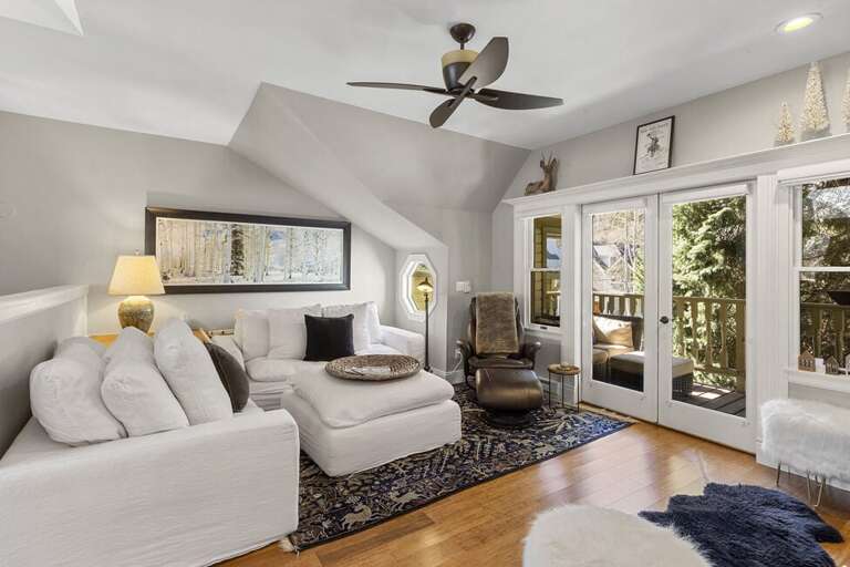 Cozy up on the softest couch ever and enjoy the warmth of the fireplace or kick back to watch your favorite movie.