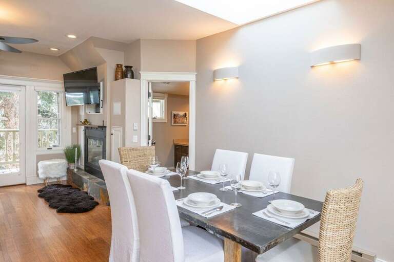 Gather around the dining table, with seating for six.