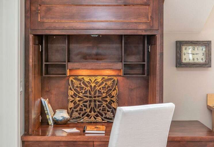 There is a hideaway workspace for your work-away needs.