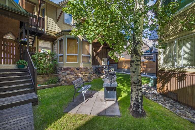Shared Green space with bike storage and gas grill.