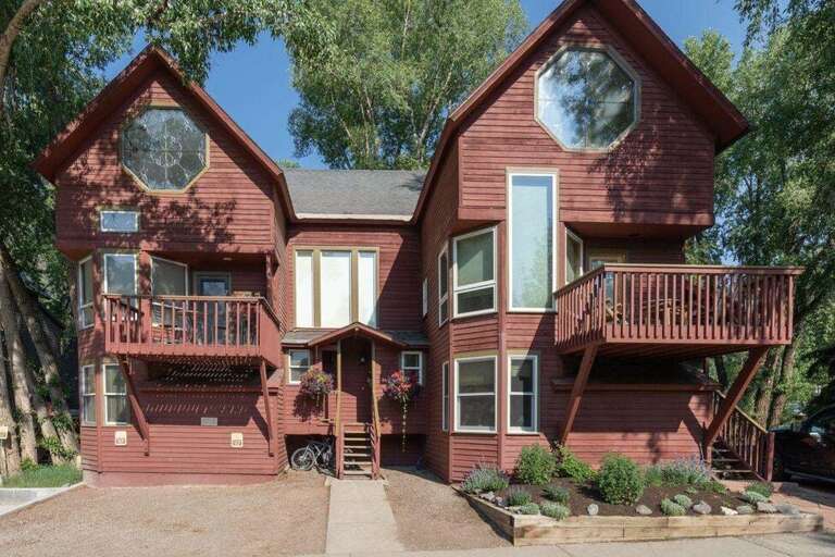 Two parking spots are to the right of the property. Two parking spots in this small town is a big deal!!