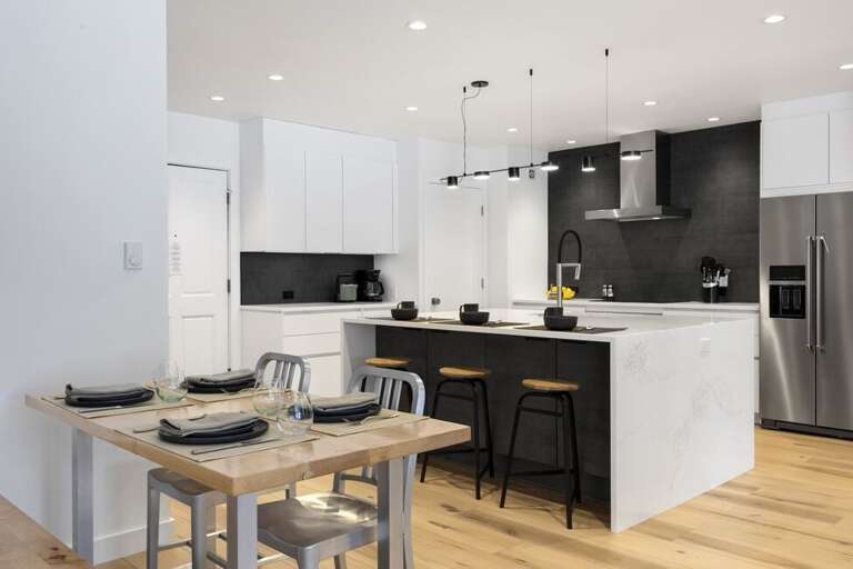 Dining area seats 4 plus counter space for dining.