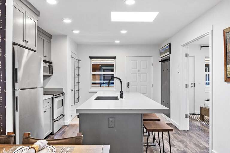 Upon entering the unit storage for shoes and jackets are available for all your gear. The first bedroom is located to the left right off the kitchen.