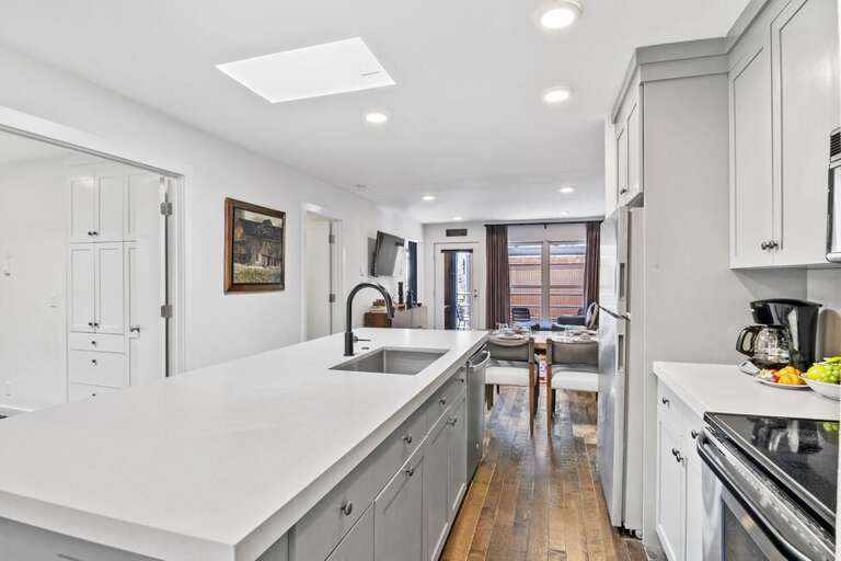 Plenty of room for entertaining or cooking with stunning natural  light from the sky lights above.