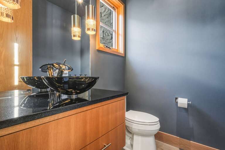 Half bathroom located off the Family level