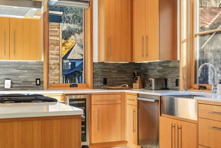 The kitchen is a luxurious, state-of-the-art space with all modern appliances and everything you need to create culinary delights, all while enjoying stunning views.