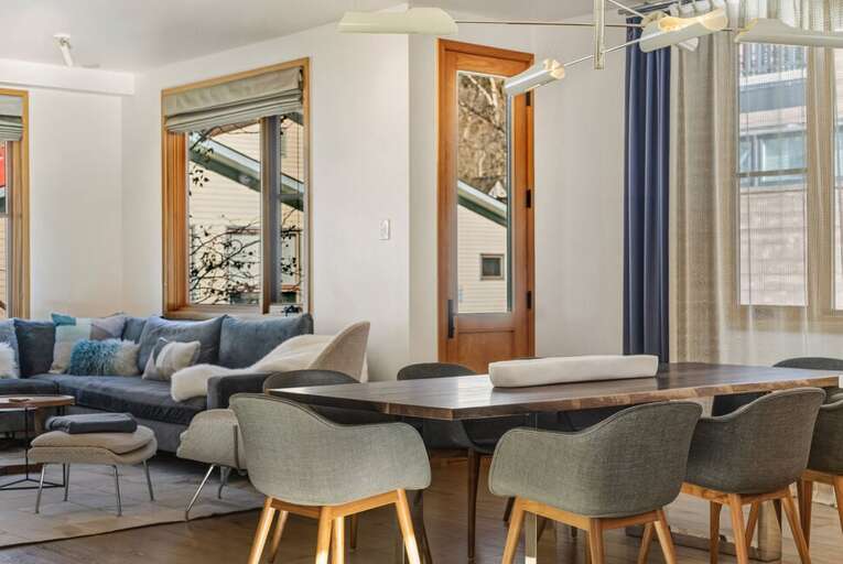 A thoughtful open layout allows the living area to integrate with the dining and kitchen spaces, perfect for family interaction