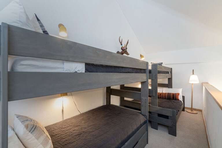 This space was recently updated with two new sets of bunk beds! 3 Twins and a Full Size Bed.