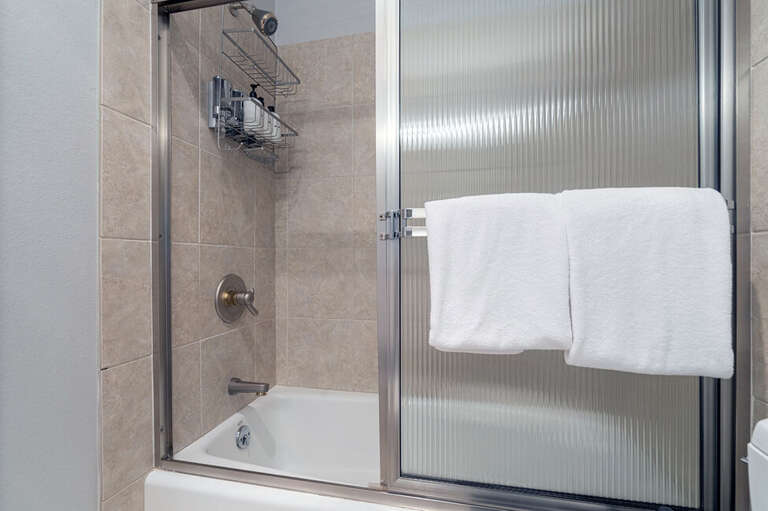 Tub/shower combo located on second level off the kitchen dining area. Tub/shower combo located on second level off the kitchen dining area.