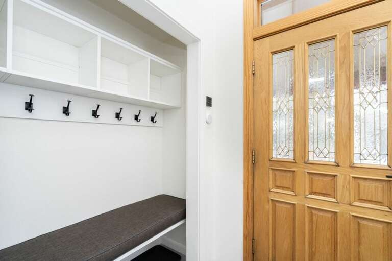 Upon entry, there's plenty of space to stash your outerwear and keep it all organized. Upon entry, there's plenty of space to stash your outerwear and keep it all organized.