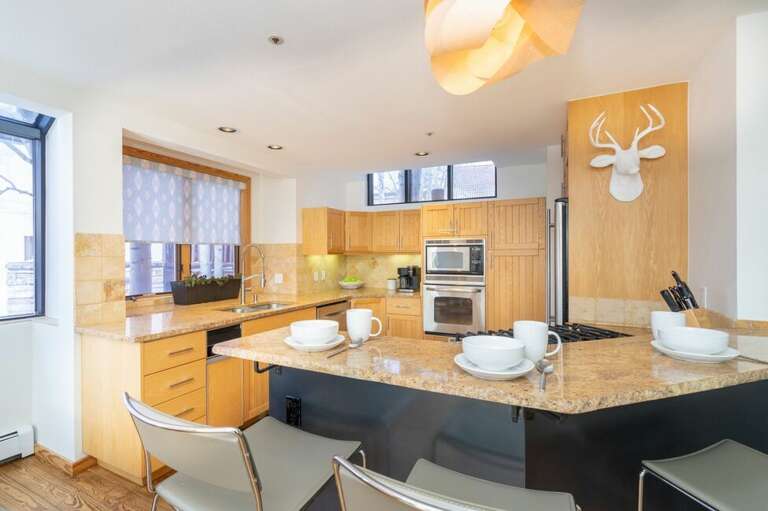 Pull up to the breakfast bar for your morning coffee or evening glass of wine. Pull up to the breakfast bar for your morning coffee or evening glass of wine.