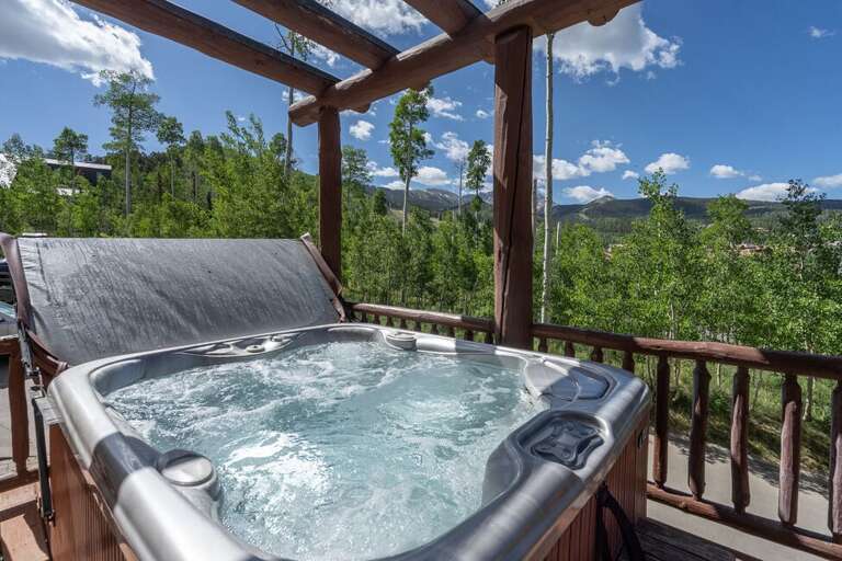 Take in the stars at night or mountain views in the daytime from the private hot tub. Take in the stars at night or mountain views in the daytime from the private hot tub.