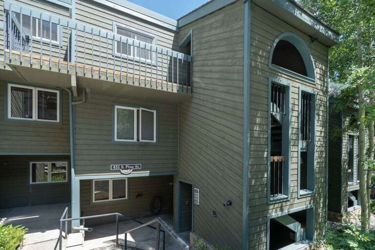 Condo is located at the bottom of the stairs. Condo is located at the bottom of the stairs.