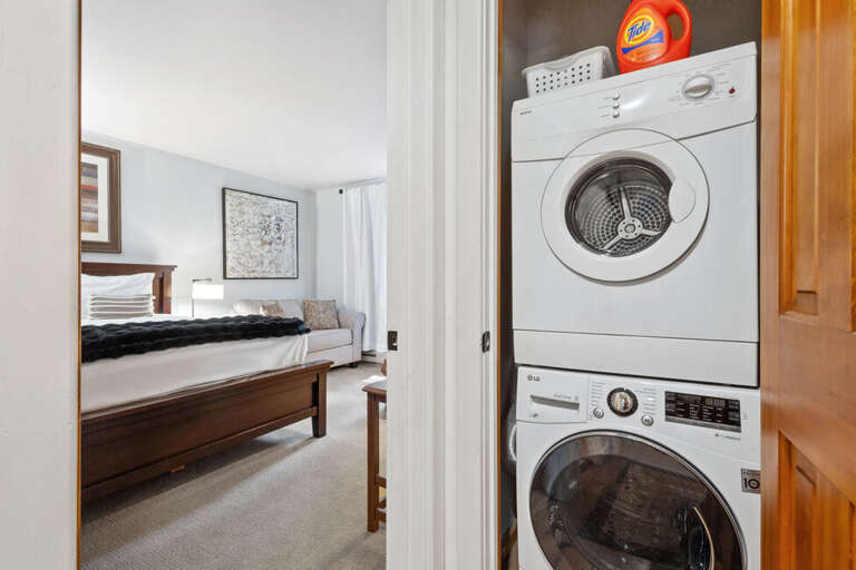 An in-unit washer/dryer, located in hallway, provides the comforts of home.