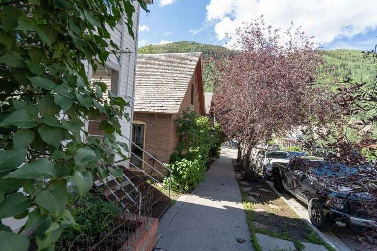 South Oak is a beautiful street adorned with plants and trees in the heart of Telluride. Walk down