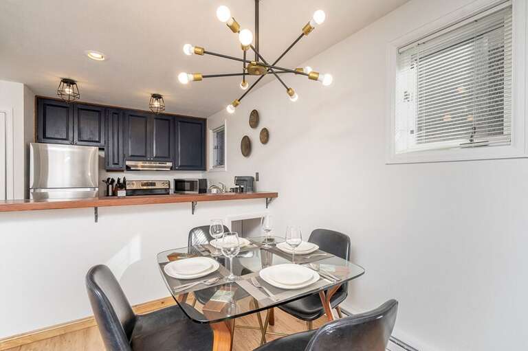 The dining area provides seating for 4 and a lovely place to enjoy your morning coffee and the paper before heading out on your day's adventure.