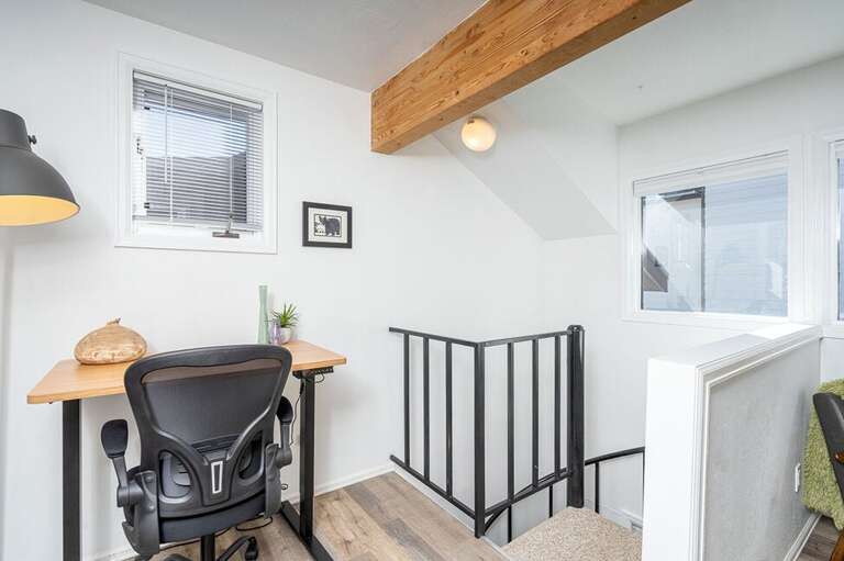 In the loft space at the top of the spiral stairs there is a desk/work space for your convenience.