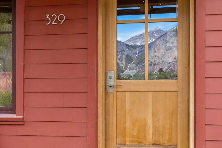 Front door reflecting Ingram Falls in window!