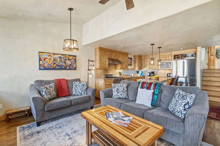 Whether cooking, dining, or lounging by the fire, this space is designed for easy, comfortable group living.