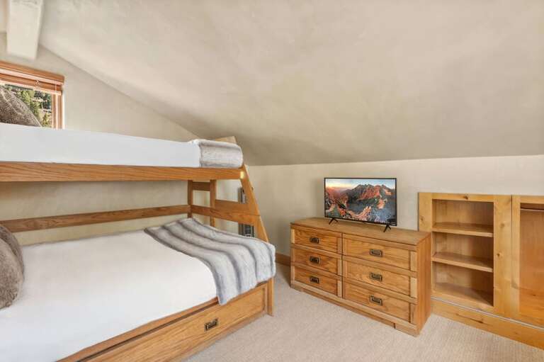 Kids and groups will love the open loft space with bunk beds and a futon for additional sleeping.