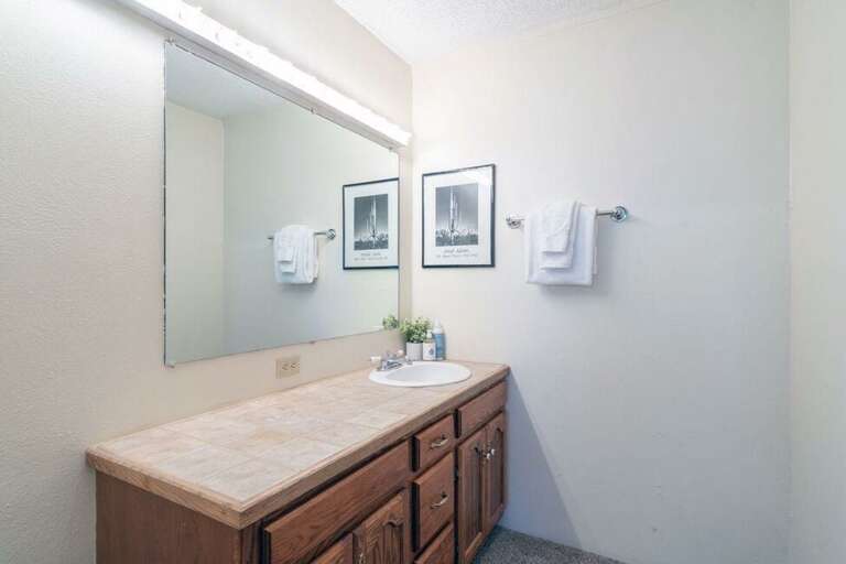 En suite bathroom on third level.