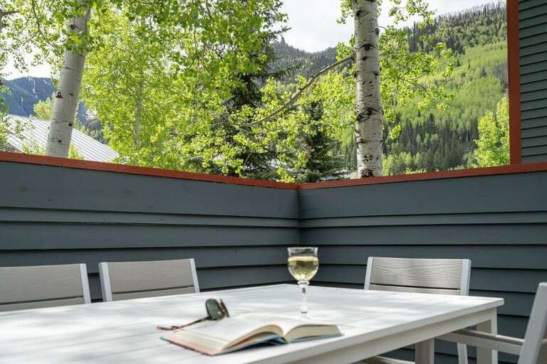 Just off the living/dining area, the private patio/deck features seating for six and plenty of fresh air.