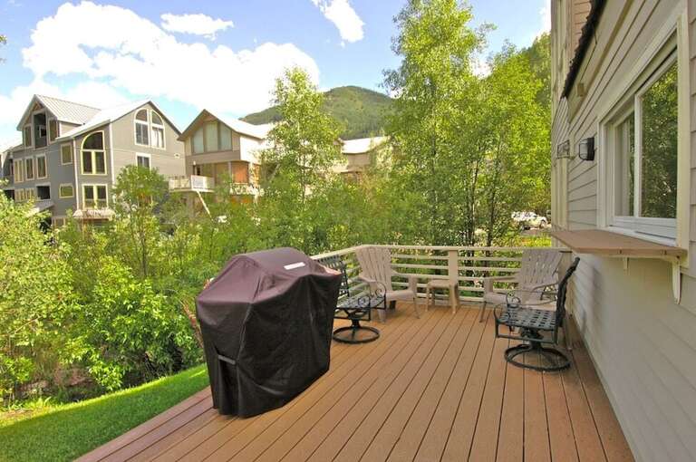 The deck comes with a bbq and furniture for fun and entertaining.